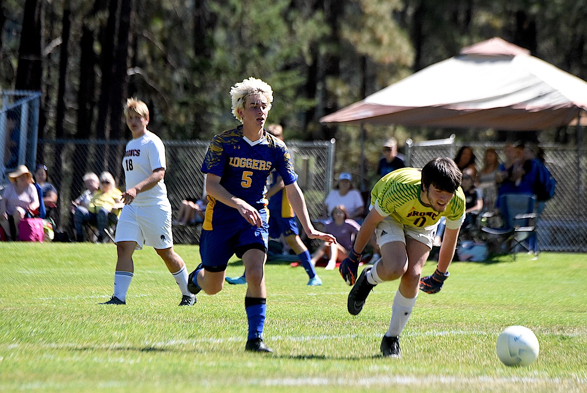 Libby's Aaron Thomas chases a loose ball against Frenchtown Saturday, Aug. 31, 2024. Thomas scored a goal in Libby's 6-1 win. (Scott Shindledecker/The Western News)