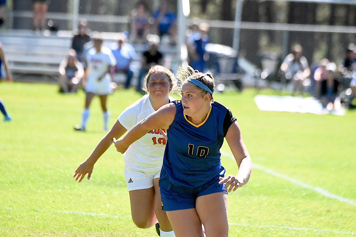 Libby's Keyera Haischer chases a loose ball against Frenchtown Saturday, Aug. 31, 2024. (Scott Shindledecker/The Western News)