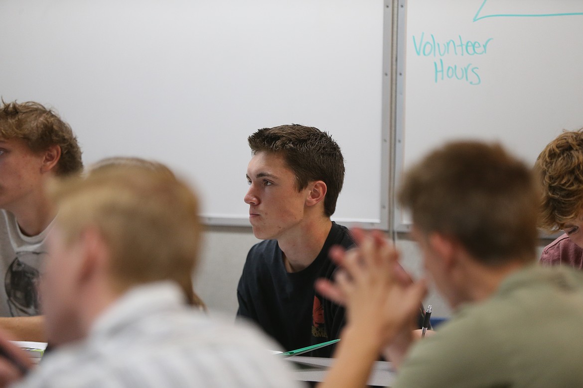 Coeur d'Alene High School senior Will Pratt pays attention in class during the first day of school Tuesday. This year's 12th graders were in seventh grade when the COVID-19 pandemic struck.