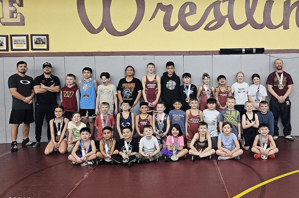 Members of the Moses Lake Wrestling Club pose for a photo. The MLWC helps cover costs for year-round wrestlers who travel to national tournaments, and next month’s Moses Lake Wrestling Golf Tournament helps to fund the MLWC.