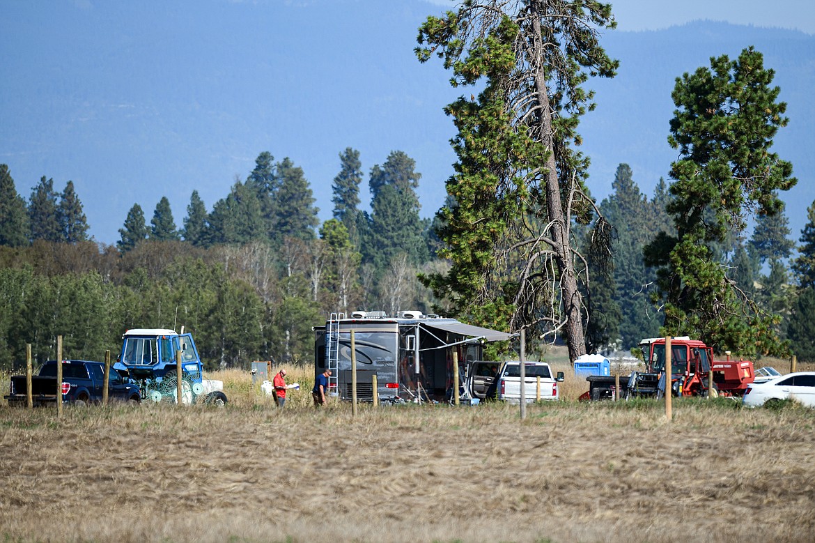 Investigators search a property after a shooting incident along Sullivan Crossroad near Columbia Falls Stage on Wednesday, Sept. 4. (Casey Kreider/Daily Inter Lake)