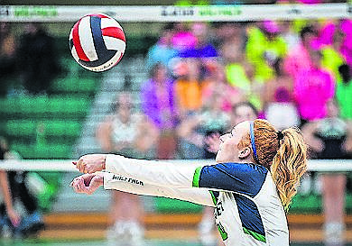 Glacier's Kenedee Moore (4) passes to a teammate against Flathead at Glacier High School on Thursday, Sept. 28. (Casey Kreider/Daily Inter Lake)