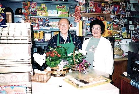 Frank and Miyo Koba stand behind the counter of Frank’s Market in an undated photo from the Columbia Basin Herald archives.