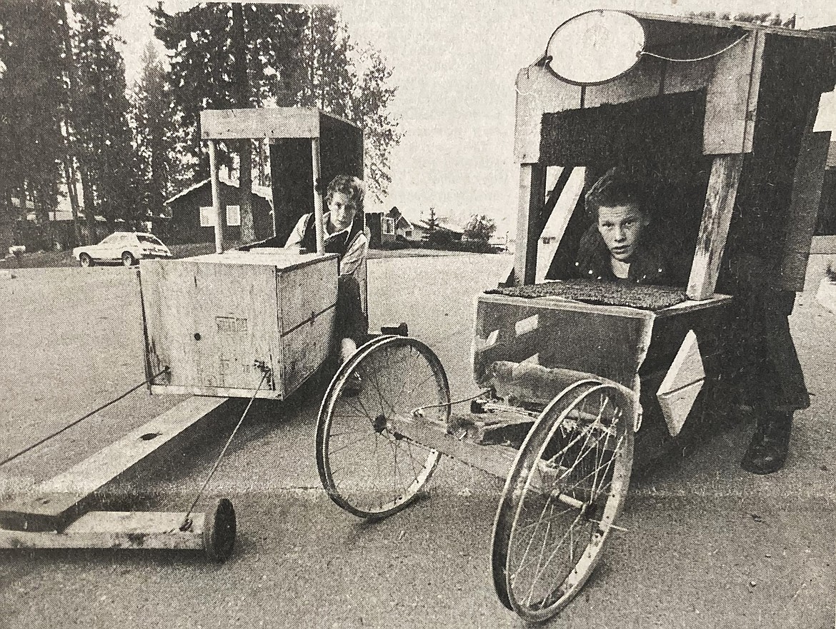 In 1979, brothers Ty, left, and Brad Hardin of Coeur d’Alene are shown with their fuel-efficient Soap Box Derby racers.