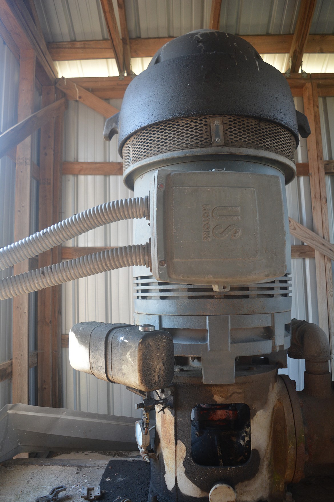 Once the site of the Satchwell Farm on Wyoming Ave., Wade and Wanda McLean's water irrigation pump gets water to the alfalfa and grass grown on the farm. The pump house was once struck by lightning and had to be rebuilt.