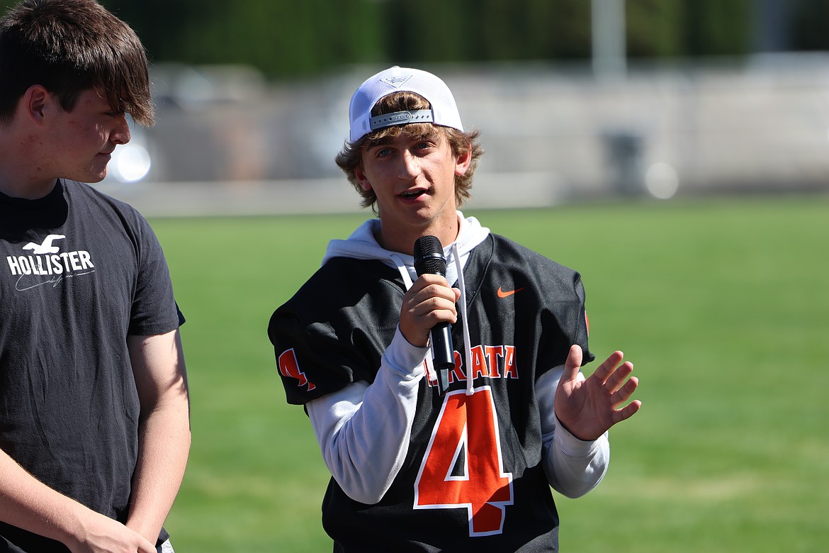 Caleb Moberg delivers a speech about Future Business Leaders of America alongside Micah Sandberg during an assembly at Ephrata High School on August 30.