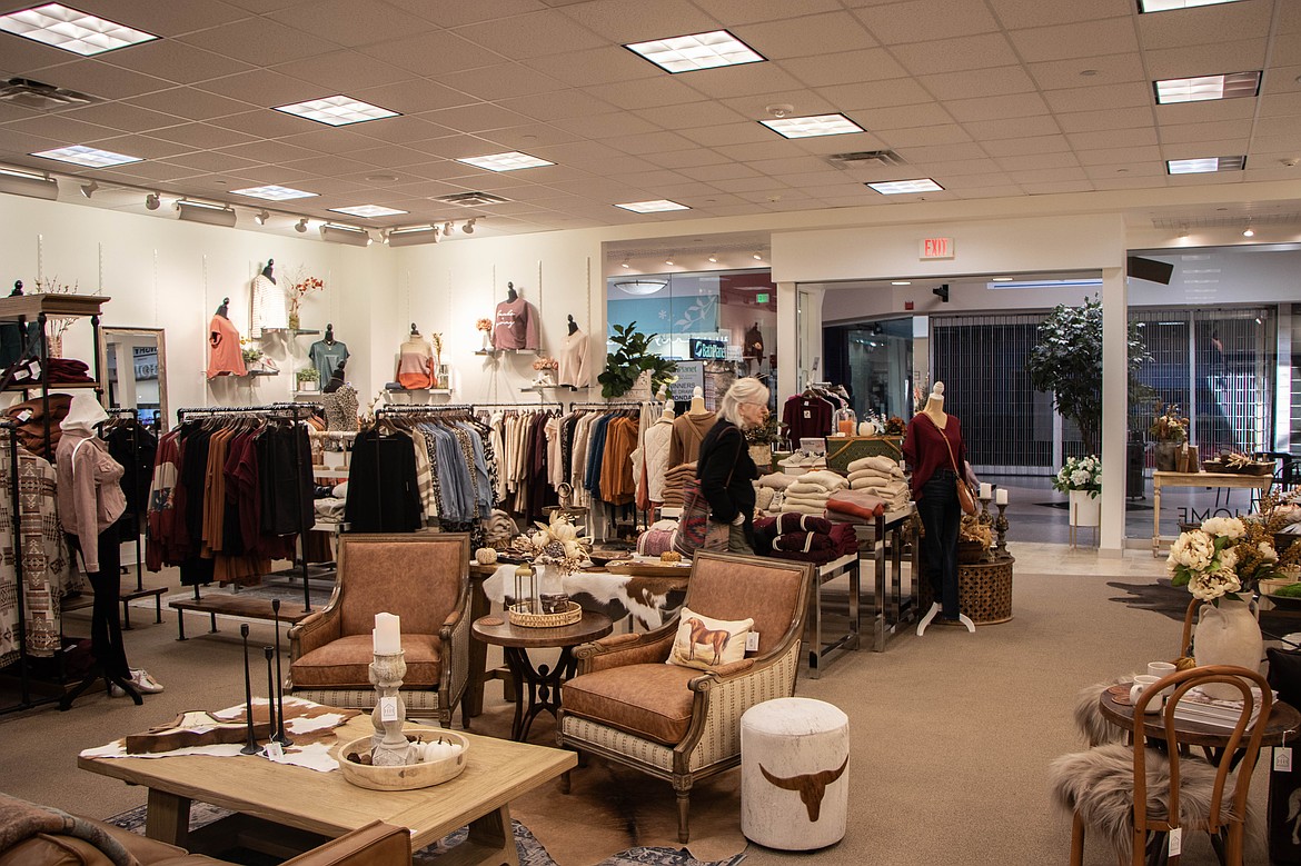 Patrons shop at the new collaboration between Hydrangea Home and Elly Jaymes in the Kalispell Center Mall. (Kate Heston/Daily Inter Lake)