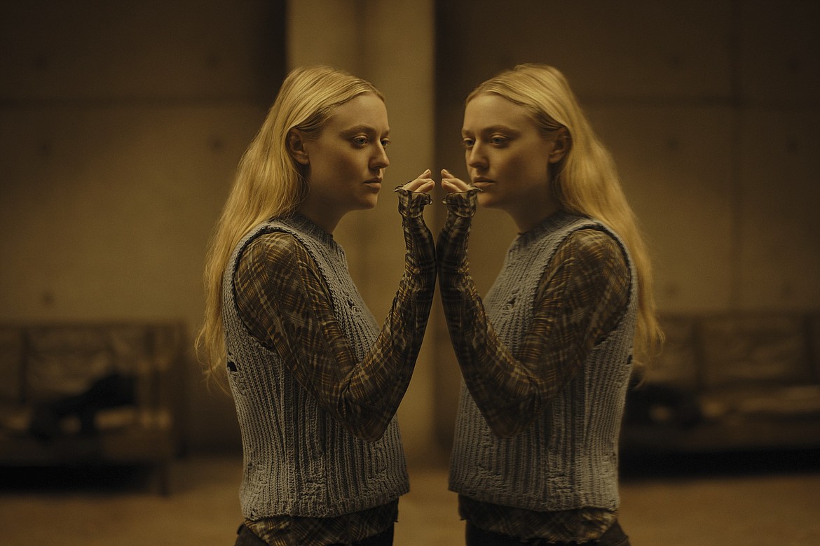 This image released by Warner Bros. Pictures shows Dakota Fanning in a scene from "The Watchers."