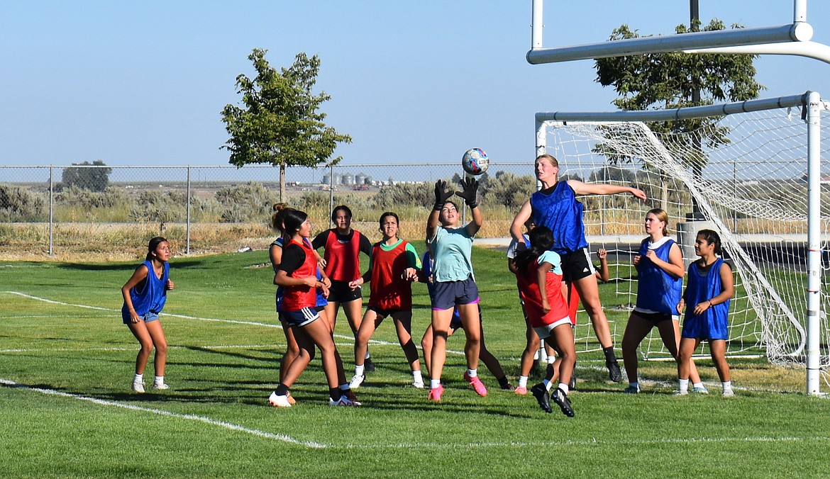 The Royal Knights girls soccer team gets some goalkeeping practice in Wednesday.