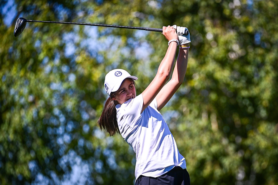 Flathead's Becky Schmidt watches her drive off the first tee during the Crosstown Cup at Village Greens on Thursday, Sept. 5. (Casey Kreider/Daily Inter Lake)