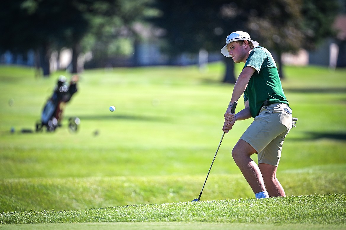 Glacier's Torren Murray chips onto the second green during the Crosstown Cup at Village Greens on Thursday, Sept. 5. (Casey Kreider/Daily Inter Lake)