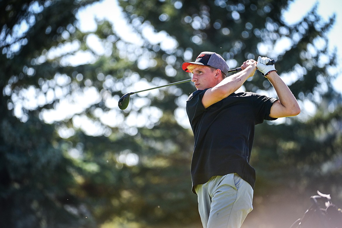 Flathead's Korbin Eaton watches his drive off the first tee during the Crosstown Cup at Village Greens on Thursday, Sept. 5. (Casey Kreider/Daily Inter Lake)