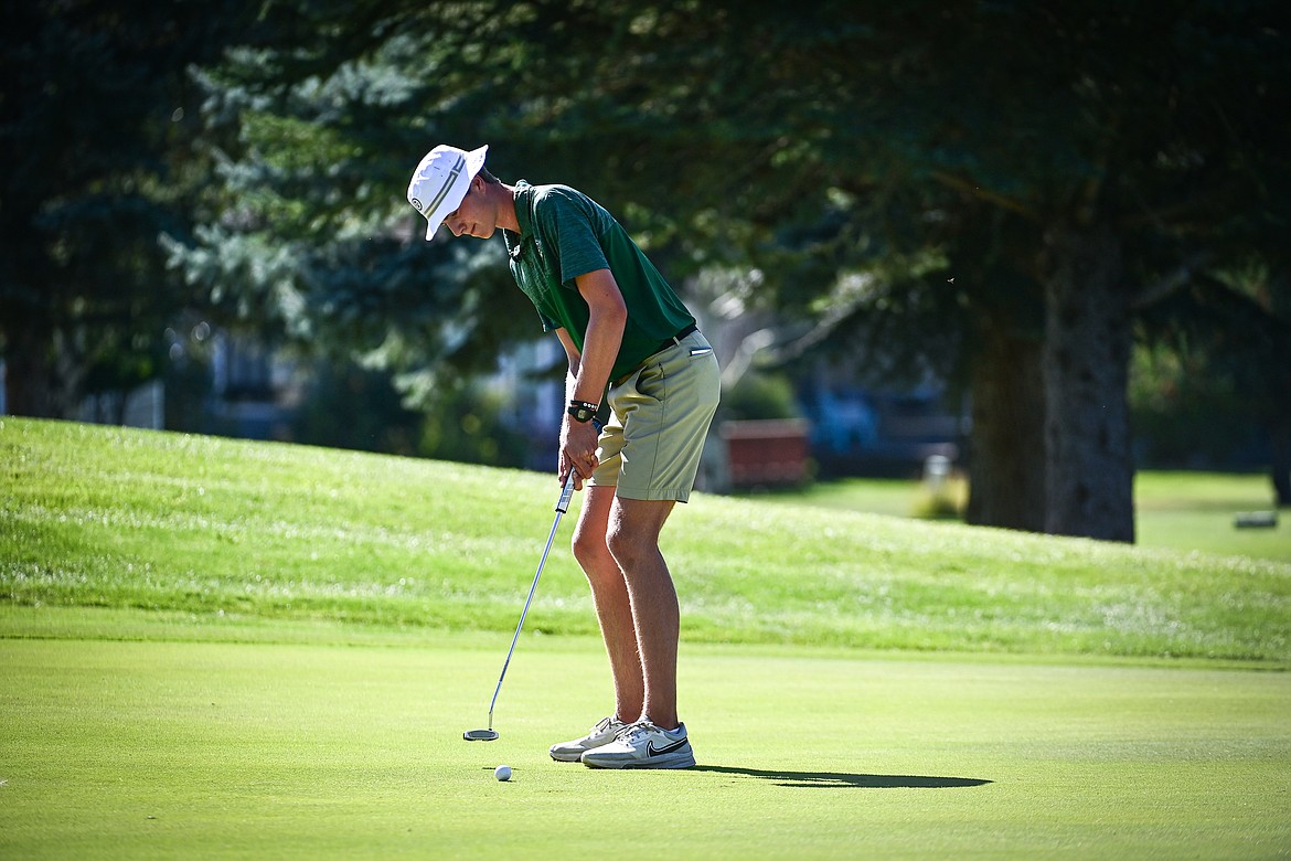 Glacier's Sam Engellant putts on the first green during the Crosstown Cup at Village Greens on Thursday, Sept. 5. (Casey Kreider/Daily Inter Lake)