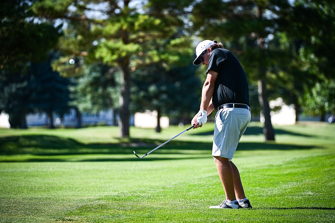 Flathead's Dylan Morris chips onto the first green during the Crosstown Cup at Village Greens on Thursday, Sept. 5. (Casey Kreider/Daily Inter Lake)