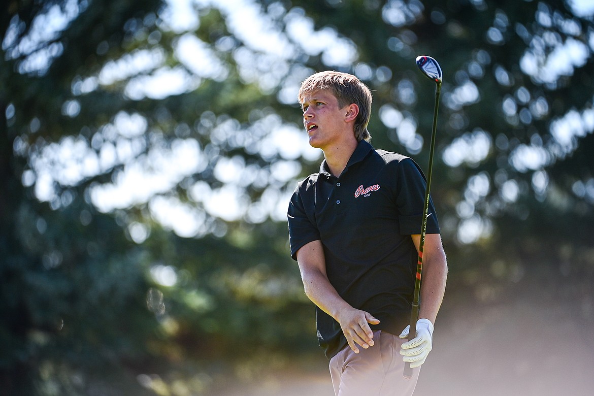 Flathead's Isaac Gall watches his drive off the first tee during the Crosstown Cup at Village Greens on Thursday, Sept. 5. (Casey Kreider/Daily Inter Lake)