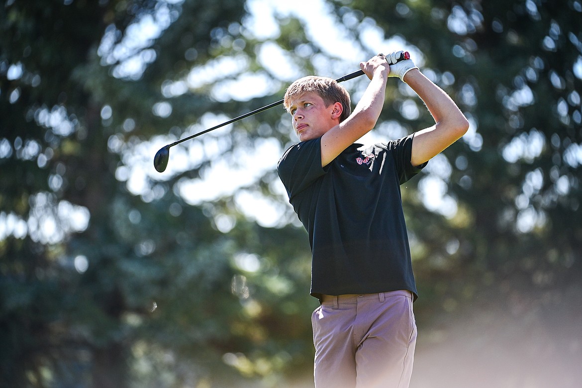 Flathead's Isaac Gall watches his drive off the first tee during the Crosstown Cup at Village Greens on Thursday, Sept. 5. (Casey Kreider/Daily Inter Lake)