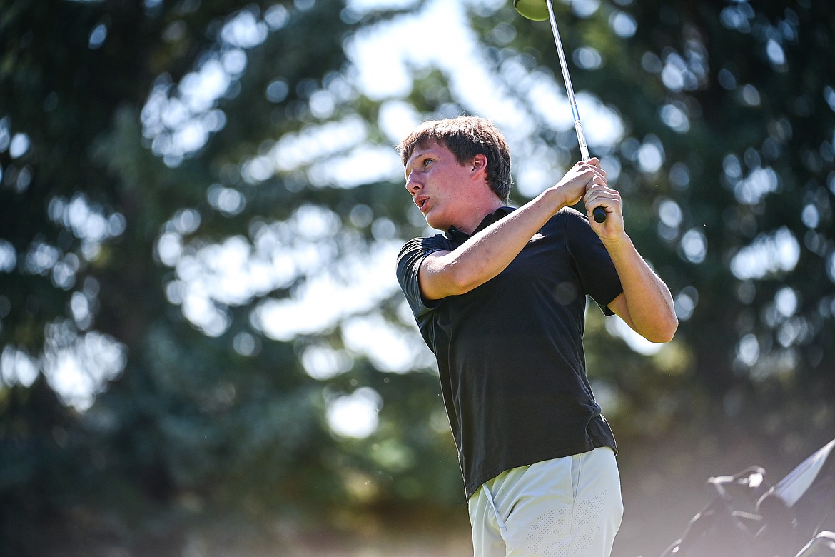 Flathead's Conner Gall watches his drive off the first tee during the Crosstown Cup at Village Greens on Thursday, Sept. 5. (Casey Kreider/Daily Inter Lake)