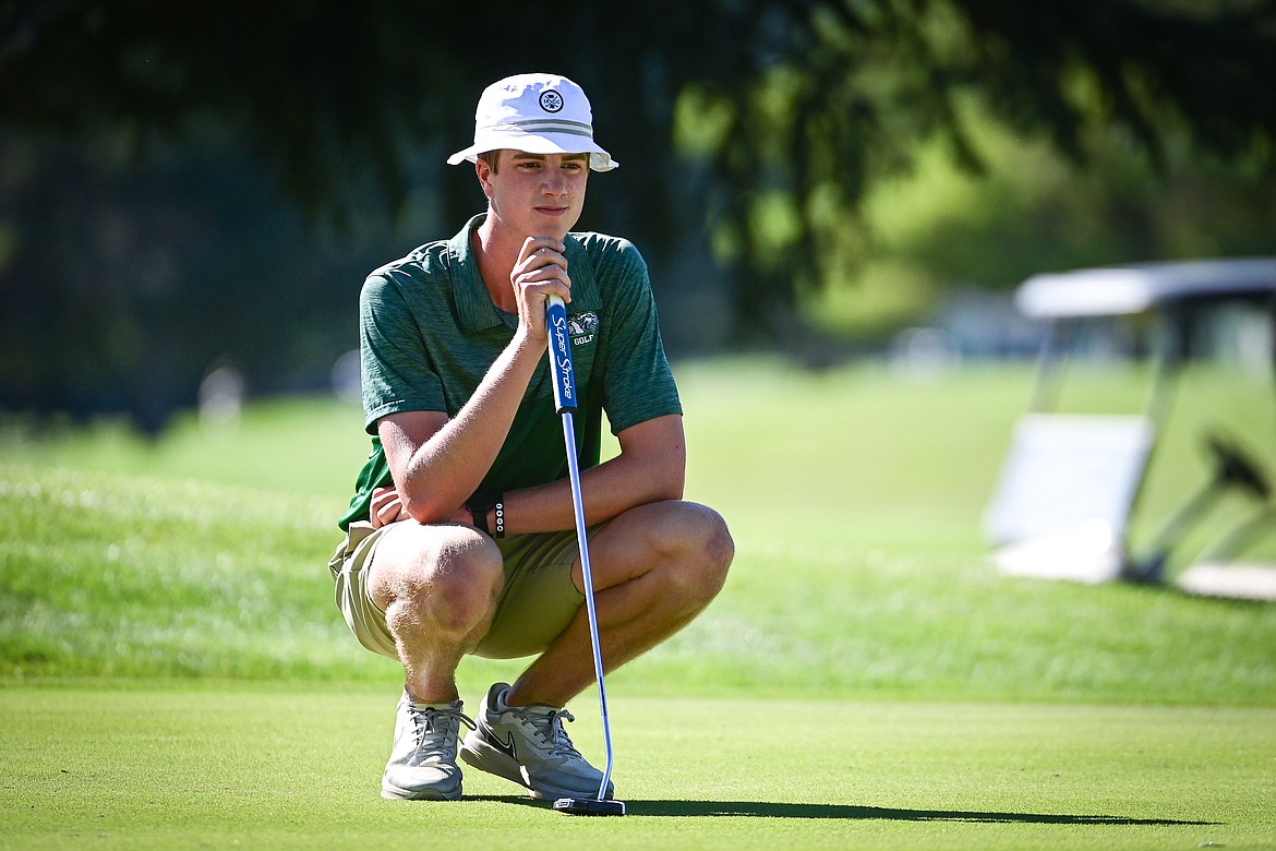 Glacier's Sam Engellant lines up a putt on the first green during the Crosstown Cup at Village Greens on Thursday, Sept. 5. (Casey Kreider/Daily Inter Lake)