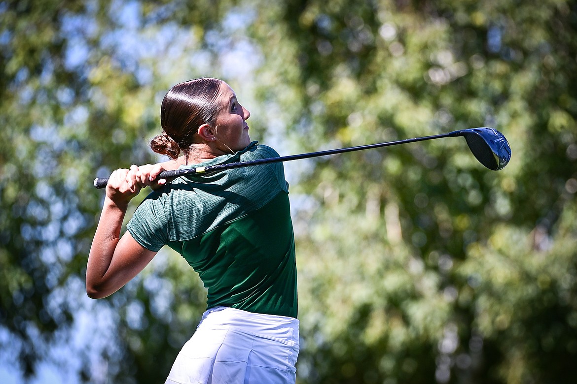 Glacier's Kendall Tkachyk watches her drive off the first tee during the Crosstown Cup at Village Greens on Thursday, Sept. 5. (Casey Kreider/Daily Inter Lake)