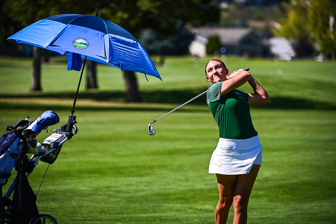 Glacier's Kendall Tkachyk watches her approach on the first fairway during the Crosstown Cup at Village Greens on Thursday, Sept. 5. (Casey Kreider/Daily Inter Lake)