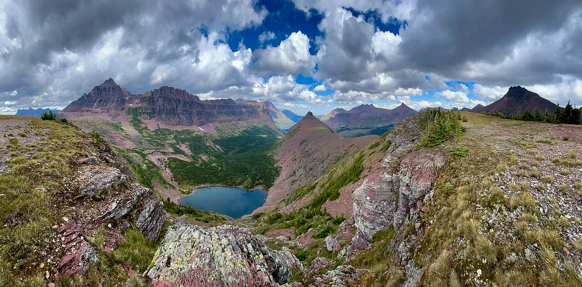 Panorama over Cobalt Lake showing Mount Rockwell, Sinopah Mountain, Rising Wolf Mountain, Painted Teepee Peak, Appistoki Peak, Mount Henry and Grizzly Mountain near Chief Lodgepole Peak on the Two Medicine Pass Trail in Glacier National Park on Wednesday, Aug. 21. (Casey Kreider/Daily Inter Lake)