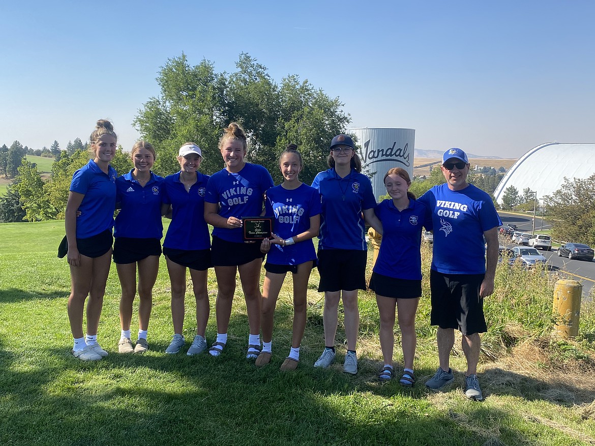 Courtesy photo
The Coeur d'Alene girls golf team won the team title at the Moscow Invitational at the University of Idaho Golf Course on Thursday. From left are Sophia Vignale, Stella Deitz, Kinsley Meier, Ella Wilson, Brooklyn Leen, Jossetta Williams, Mady Riley and coach Jeff Lake.