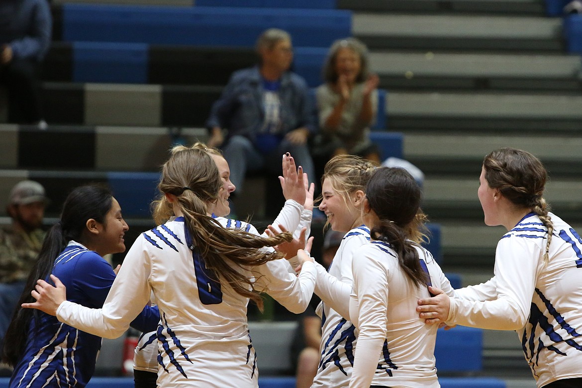 Soap Lake players celebrate after scoring a point last season.