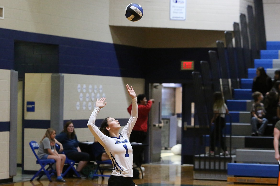 Soap Lake junior Mylee Dana serves the ball during an Eagle home game last season.