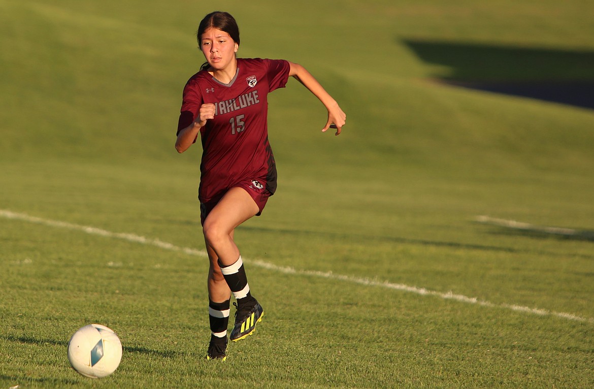 Wahluke senior Melany Meza Mendoza brings the ball up the field during a game against Quincy last season.