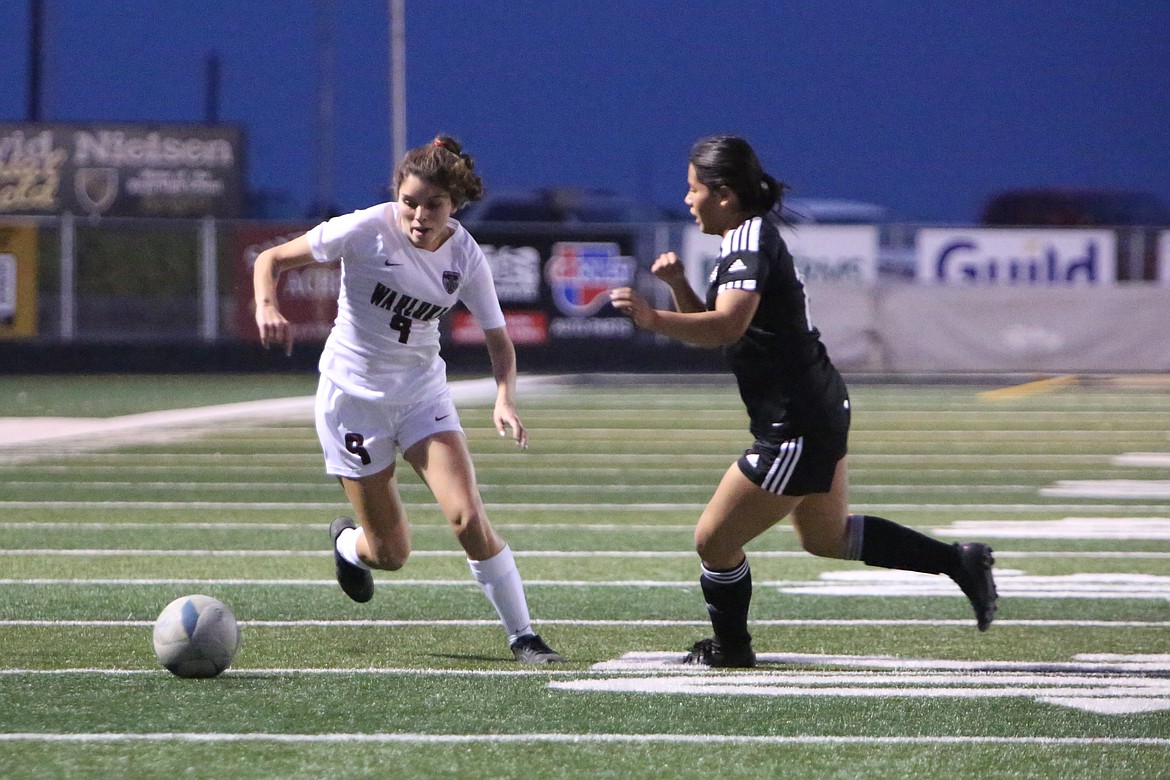 Wahluke graduate Angelica Fabela (9) advances past a Royal defender last season. Fabela was one of four Warriors from last year’s roster who graduated in the spring.