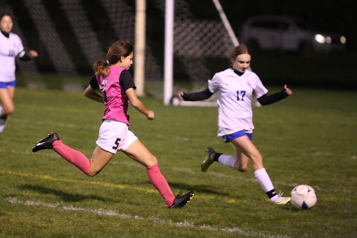 Wahluke sophomore Lorraine Badillo (5) rushes in to take the ball away from a Kiona-Benton player last season.