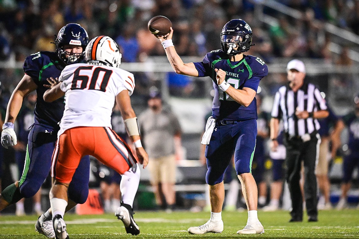 Glacier quarterback Jackson Presley (12) drops back to pass in the third quarter against Billings Senior at Legends Stadium on Friday, Sept. 6. (Casey Kreider/Daily Inter Lake)