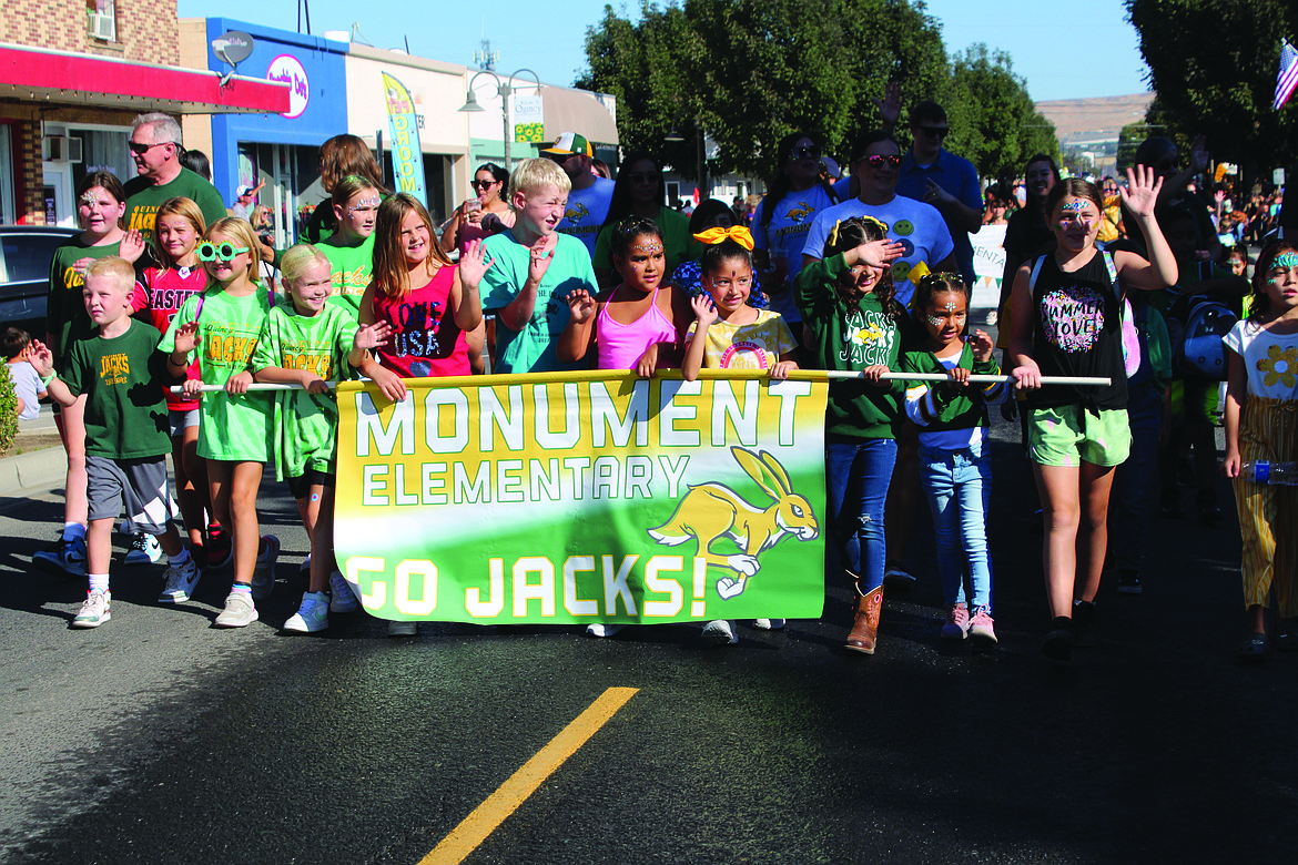 Students from Monument Elementary wave to the crowd at the 2023 FCAD parade. Quincy’s annual celebration of agriculture will be Sept. 14.