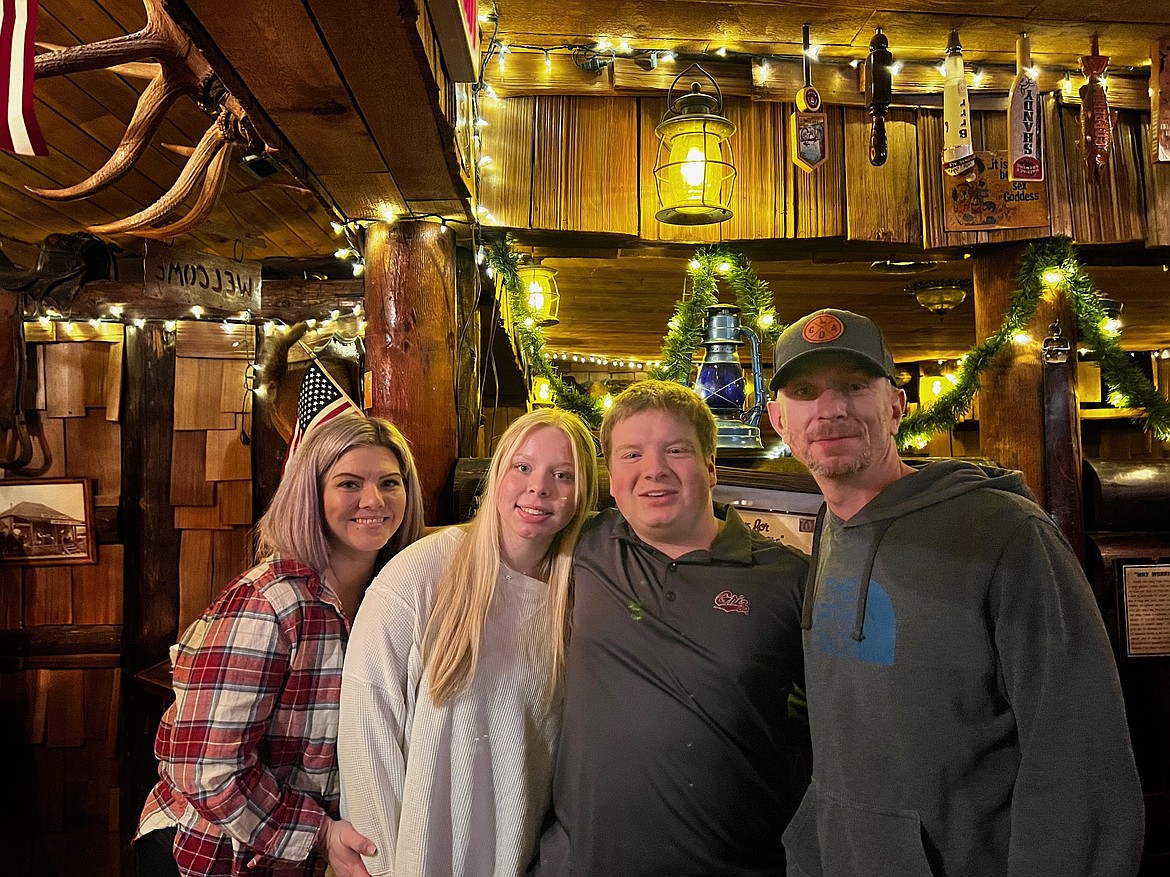 From left to right: Jessica Moore, Kyrsten Moore, CJ Giao, Will Moore at the Wolf Lodge Steakhouse in January.