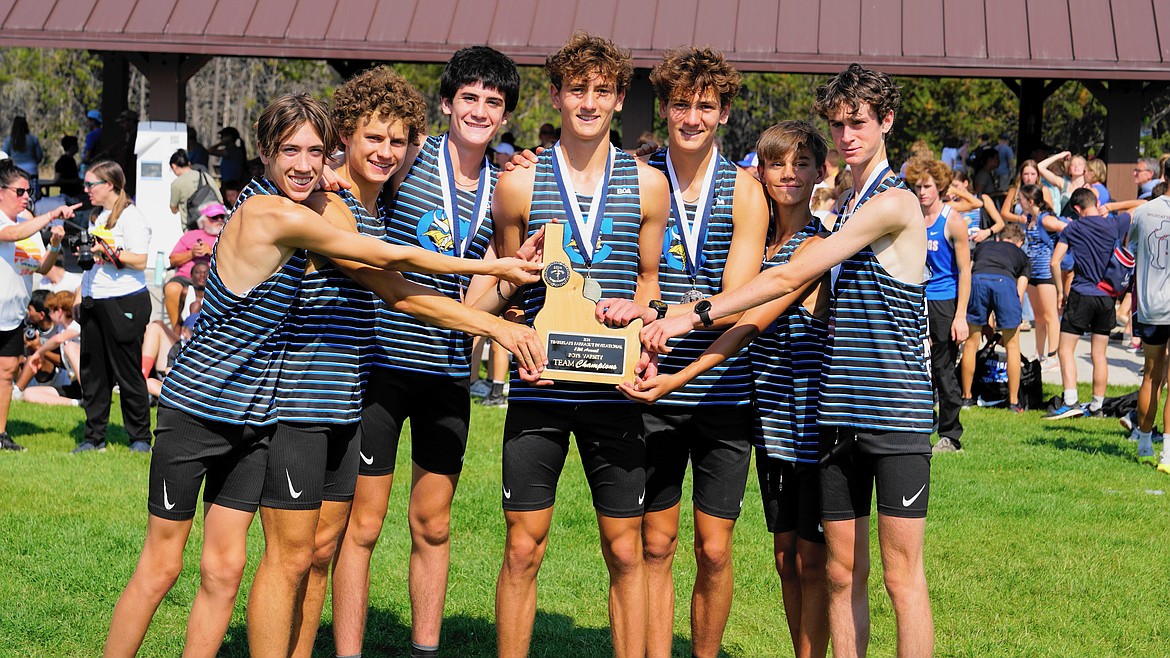 Courtesy photo
The Coeur d'Alene boys cross country team opened the season by winning the 30-team Timberlake Farragut Invitational on Saturday at Farragut State Park. From left are Rowan Henry, Kyle Rohlinger, Wyatt Carr, Max Cervi-Skinner, Zack Cervi-Skinner, Wyatt Morgenstern, and Gabe Heule.