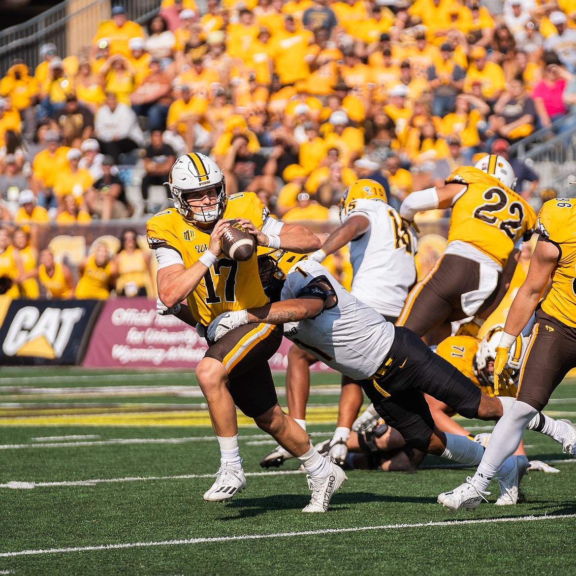 Photo by IDAHO ATHLETICS
Keyshawn James-Newby (1) of Idaho had three sacks on Saturday, including this one of Wyoming quarterback Evan Svoboda in Laramie, Wyo.