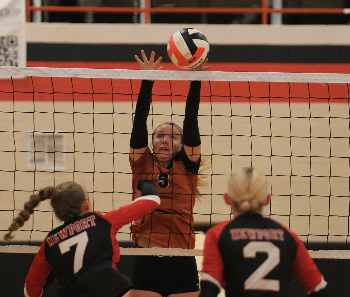 Priest River High sophomore Raygn Turner looks to block a Newport attacker during Friday night's game.