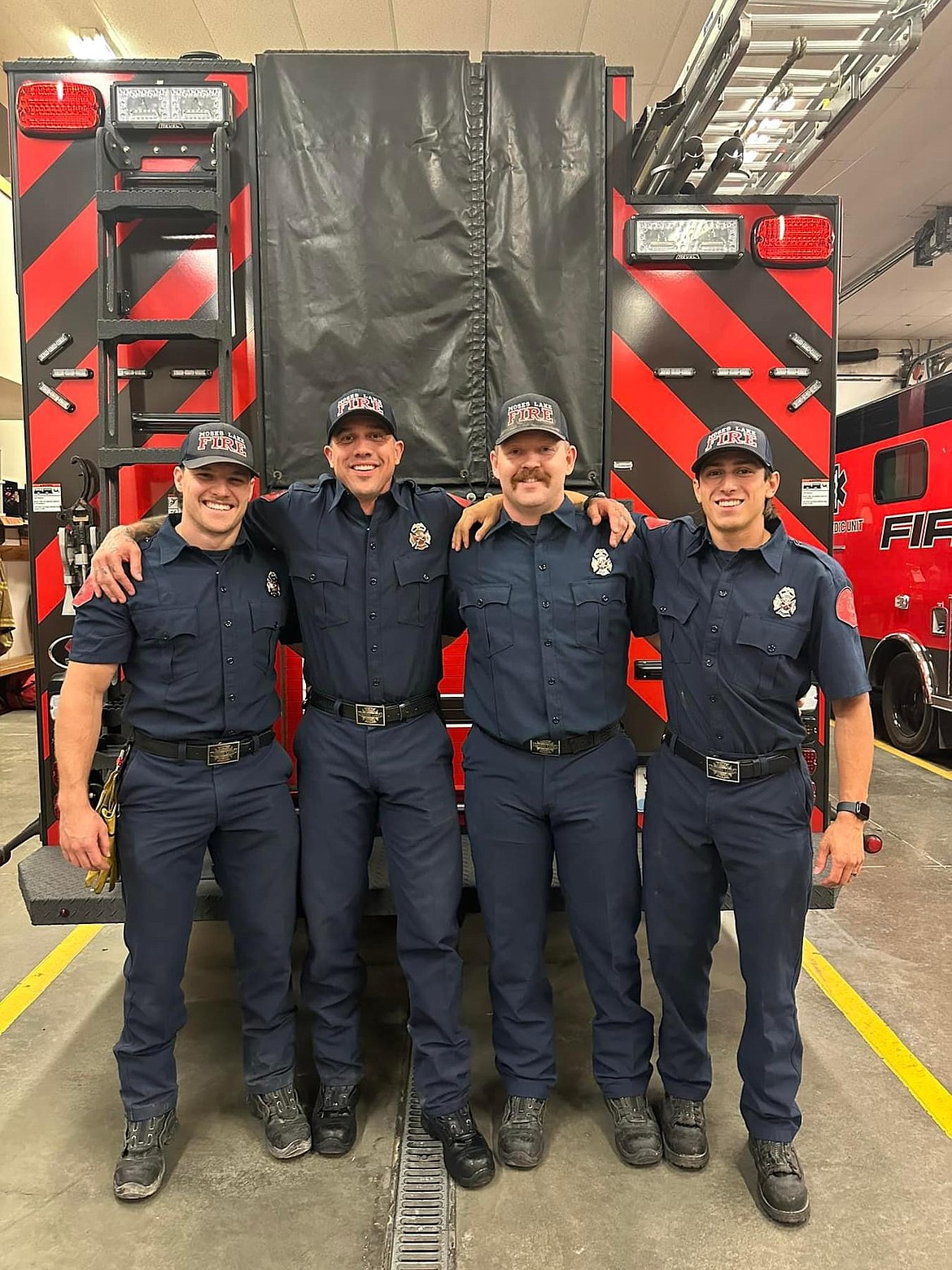 From left to right: Zachary Feist, Joshua Bollinger, Nathan Aamold and Christopher Gonzalez Rice all received their badges after completing their first year at the Moses Lake Fire Department last week.