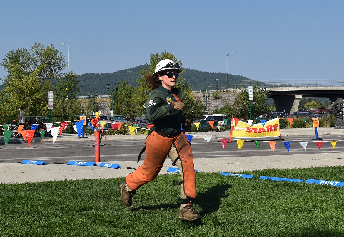 Julia De Oliveira completes the 5k in full Montana Conservation Corps gear at the Great Fish Community Challenge Saturday. (Kelsey Evans/Whitefish Pilot)