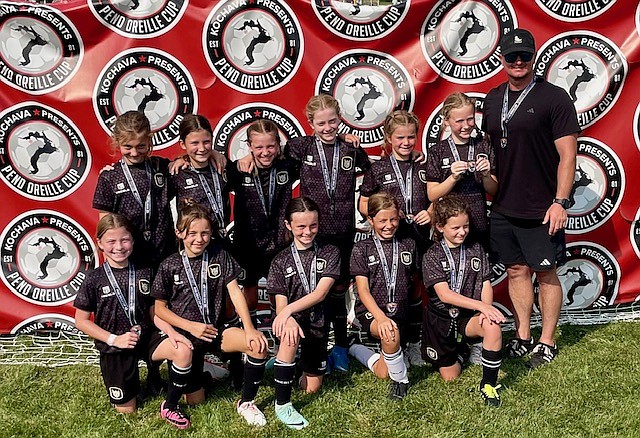 Courtesy photo
The Sting SC 2015 girls yellow soccer team took second place in its division at the Pend Oreille Cup in Sandpoint last weekend. In the front row from left are Hailey Gurgel, Lola Peterson, Addison Conley, Amaryl Ryan and Callie O’Brien; and back row from left, Callum Chesnut, Hailey Blue, Charolette Denton, Tatum Chesnut, Liviana Staeheli, Emma Richards and coach Nate Coneley.