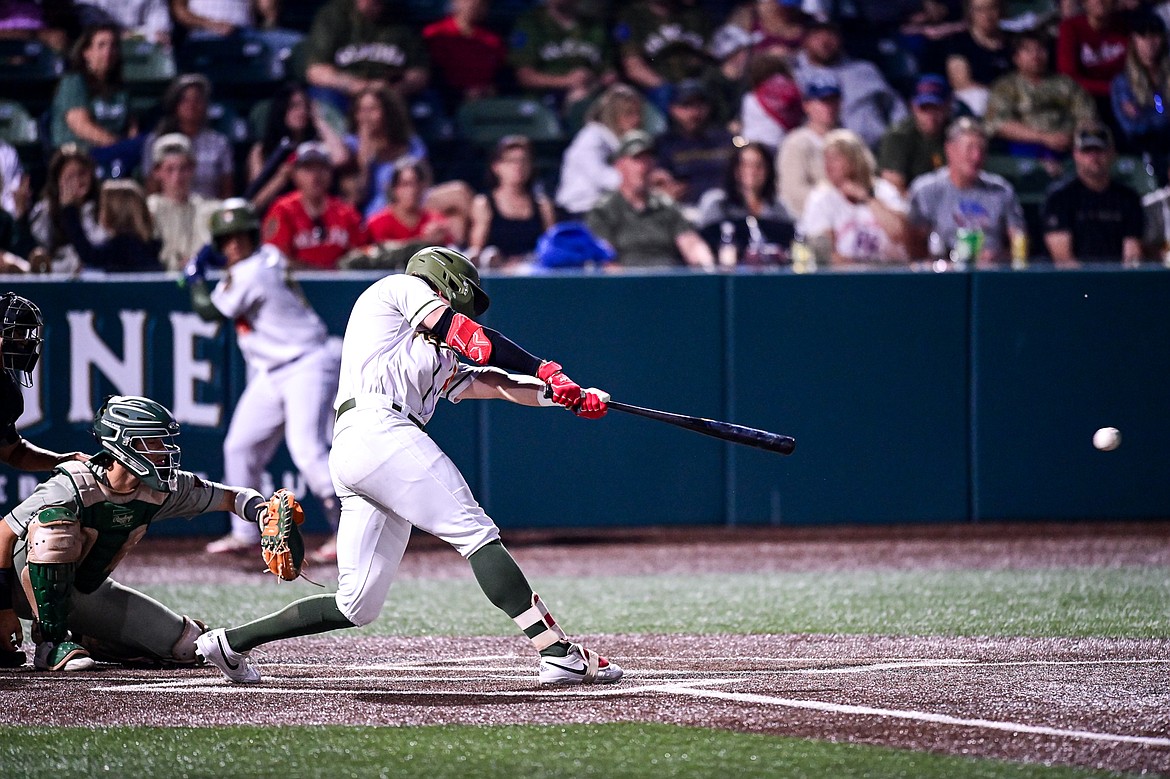 Glacier's Ty Penner (3) singles up the middle in the fourth inning against Missoula at Glacier Bank Park on Tuesday, Sept. 10. (Casey Kreider/Daily Inter Lake)