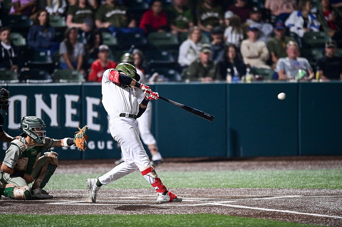 Glacier's Chad Castillo (28) drives in Gabe Howell from first base with a double in the sixth inning against Missoula at Glacier Bank Park on Tuesday, Sept. 10. (Casey Kreider/Daily Inter Lake)