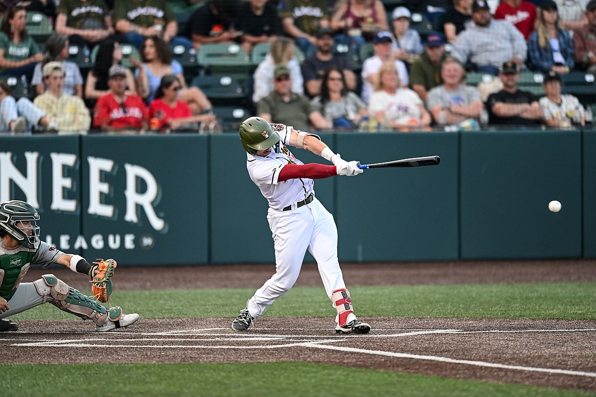 Glacier's Christian Kirtley (1) drives in Ryan McCarthy in the first inning against Missoula at Glacier Bank Park on Tuesday, Sept. 10. (Casey Kreider/Daily Inter Lake)