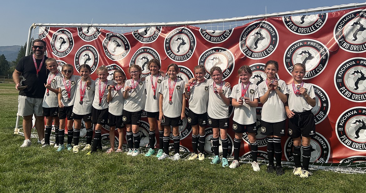 Courtesy photo
The Sting SC 2015 girls soccer team won the championship in their division last weekend at the Pend Oreille Cup in Sandpoint. From left are coach Kyle Havercroft, Malia Acker, Charlotte Nelson, Nora Havercroft, Isla Shupe, June Greene, Kit Fields, Cielle Ellis, Camryn Cline, Beckett Murphey, Madison Malone, Makena Malone, SyRae Boatman and Isabelle Caywood.