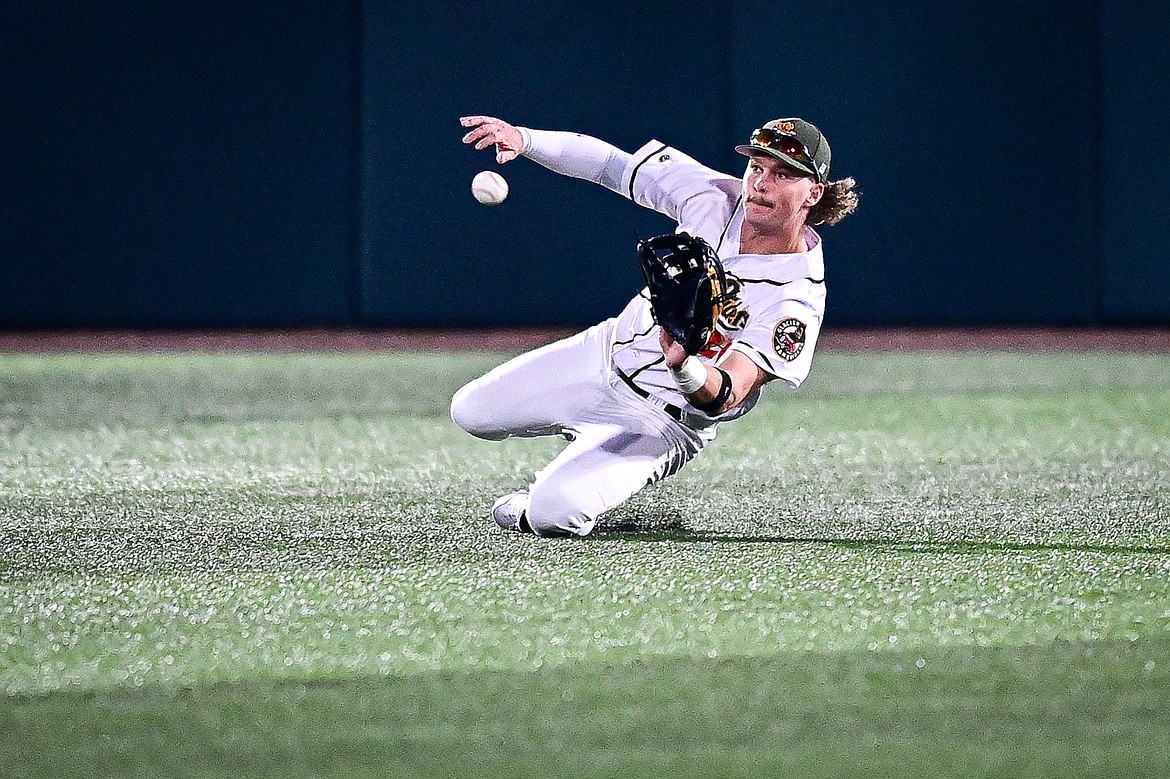 Range Riders centerfielder Kingston Liniak (20) makes a sliding catch on a line drive against Missoula  at Glacier Bank Park on Tuesday, Sept. 10. (Casey Kreider/Daily Inter Lake)