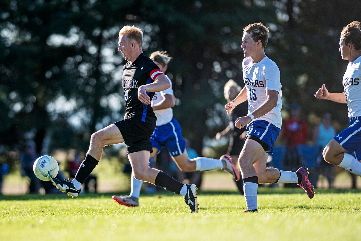 Viking Robert Merchant breaks away from the Loggers to score on Thursday. (Avery Howe/Bigfork Eagle)