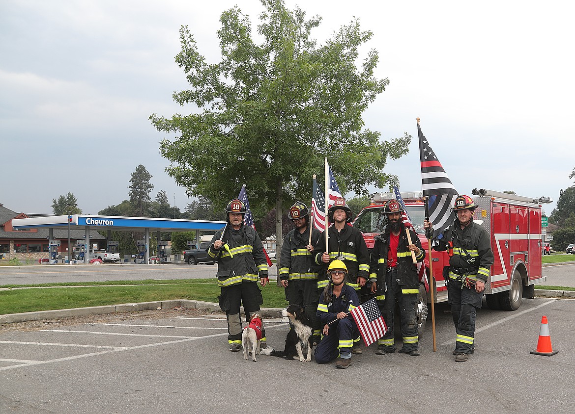 Clark Fork Volunteer Fire Department firefighters pose for a photo after walking across the Long Bridge and back to pay tribute to the firefighters who worked on 9/11 after terrorists crashed planes into the World Trade Center's Twin Towers. Pictured are Austin Theander, Myles O'Quinn, Devon Nesselroth, Austin Harp, Kelly Kearns and Tanya Becker.