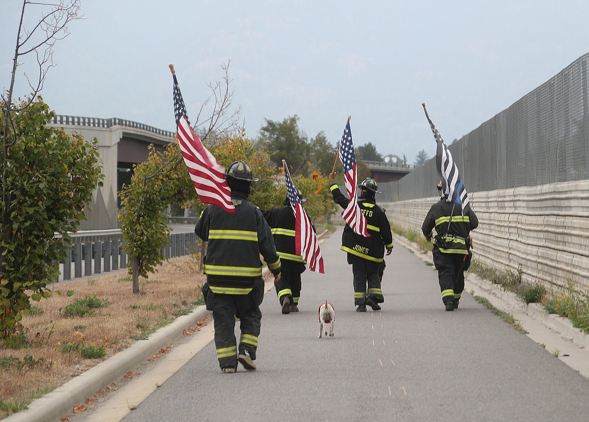 Clark Fork Volunteer Fire Department firefighters paid tribute to those who lost their lives in the Sept. 11, 2001, terrorist attacks as well as to the first responders who responded to the scene in New York City, Washington, D.C., and Shanksville, Pa.