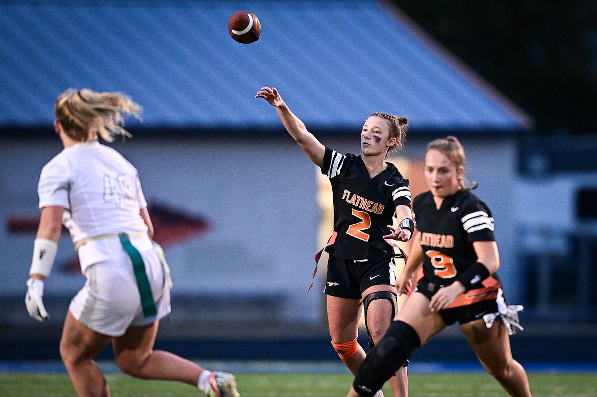 Flathead's Kenlie Roth (2) drops back to pass against Glacier at Legends Stadium on Thursday, Sept. 12. (Casey Kreider/Daily Inter Lake)