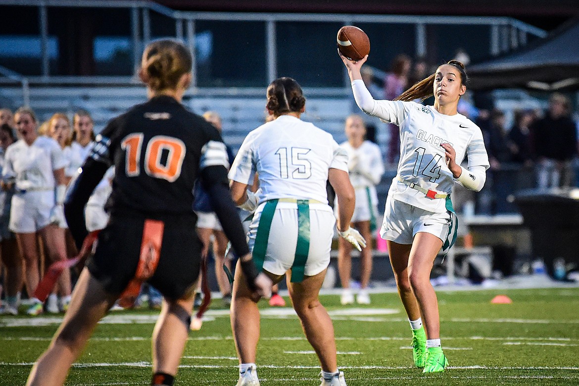 Glacier quarterback Karley Allen (14) drops back to pass against Flathead at Legends Stadium on Thursday, Sept. 12. (Casey Kreider/Daily Inter Lake)